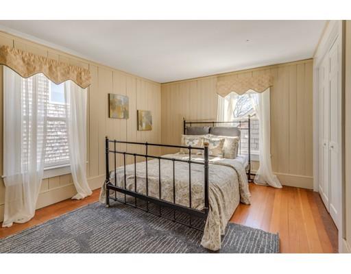26 Rowley Shore Gloucester, MA 01930 - Photo 12 of 18 a bedroom with furniture and wooden floor