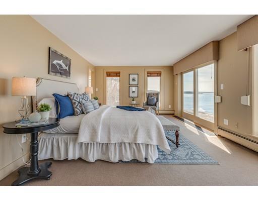 26 Rowley Shore Gloucester, MA 01930 - Photo 13 of 18 a bedroom with a bed and window