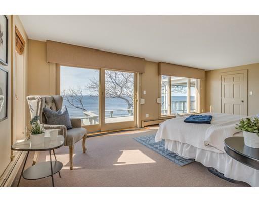 26 Rowley Shore Gloucester, MA 01930 - Photo 14 of 18 a living room with furniture and a large window