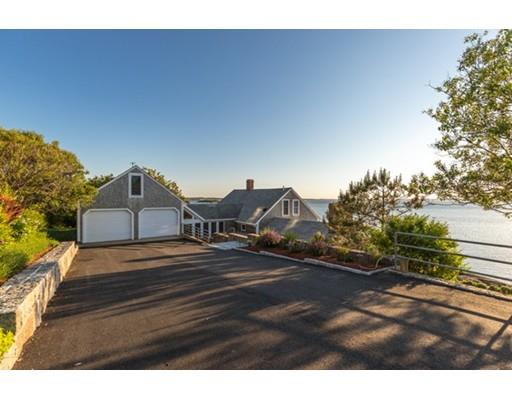 26 Rowley Shore Gloucester, MA 01930 - Photo 3 of 18 a view of a street in front of a house