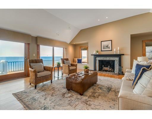 26 Rowley Shore Gloucester, MA 01930 - Photo 5 of 18 a living room with furniture and a fireplace
