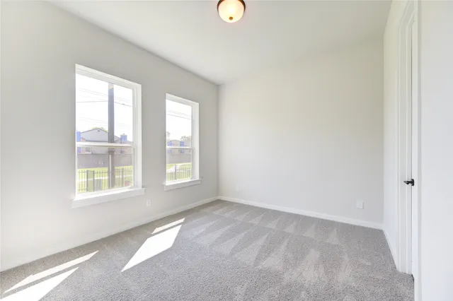 a bathroom with a sink toilet a mirror and shower