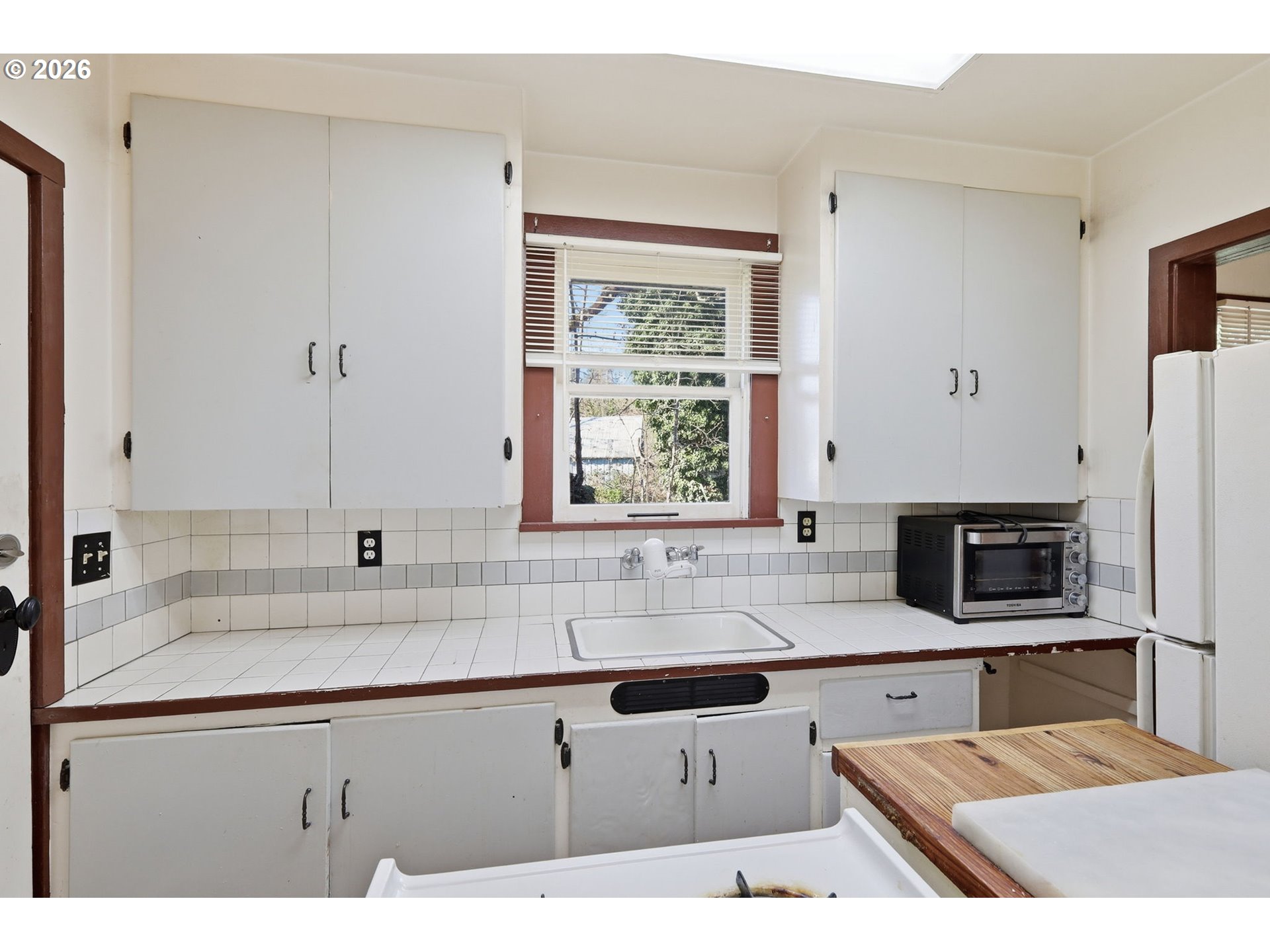 36725 Jasper Road Springfield, OR 97478 - Photo 27 of 46 a kitchen with stainless steel appliances granite countertop a sink a stove and a microwave
