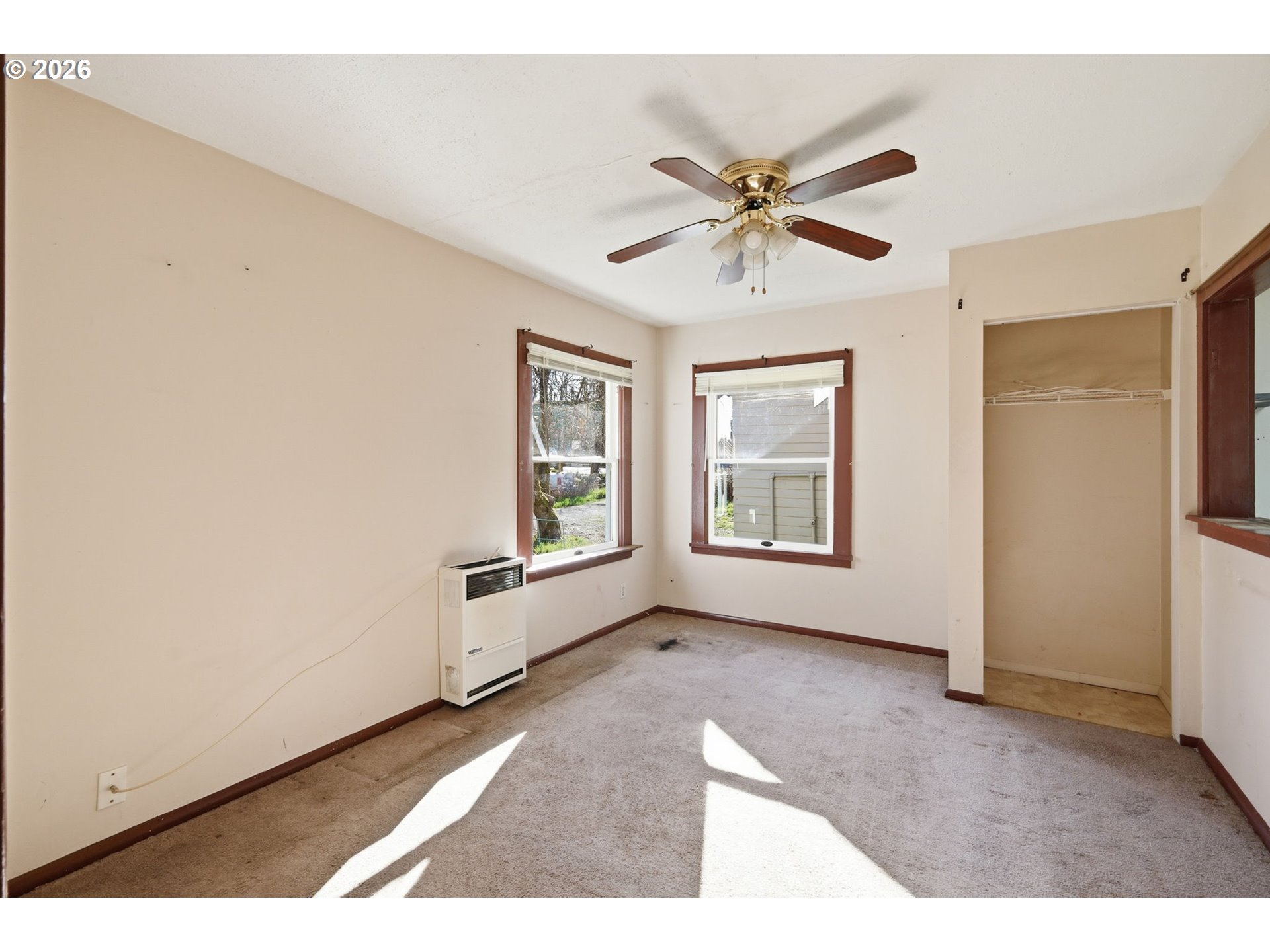 36725 Jasper Road Springfield, OR 97478 - Photo 31 of 46 a view of a livingroom with a ceiling fan and window