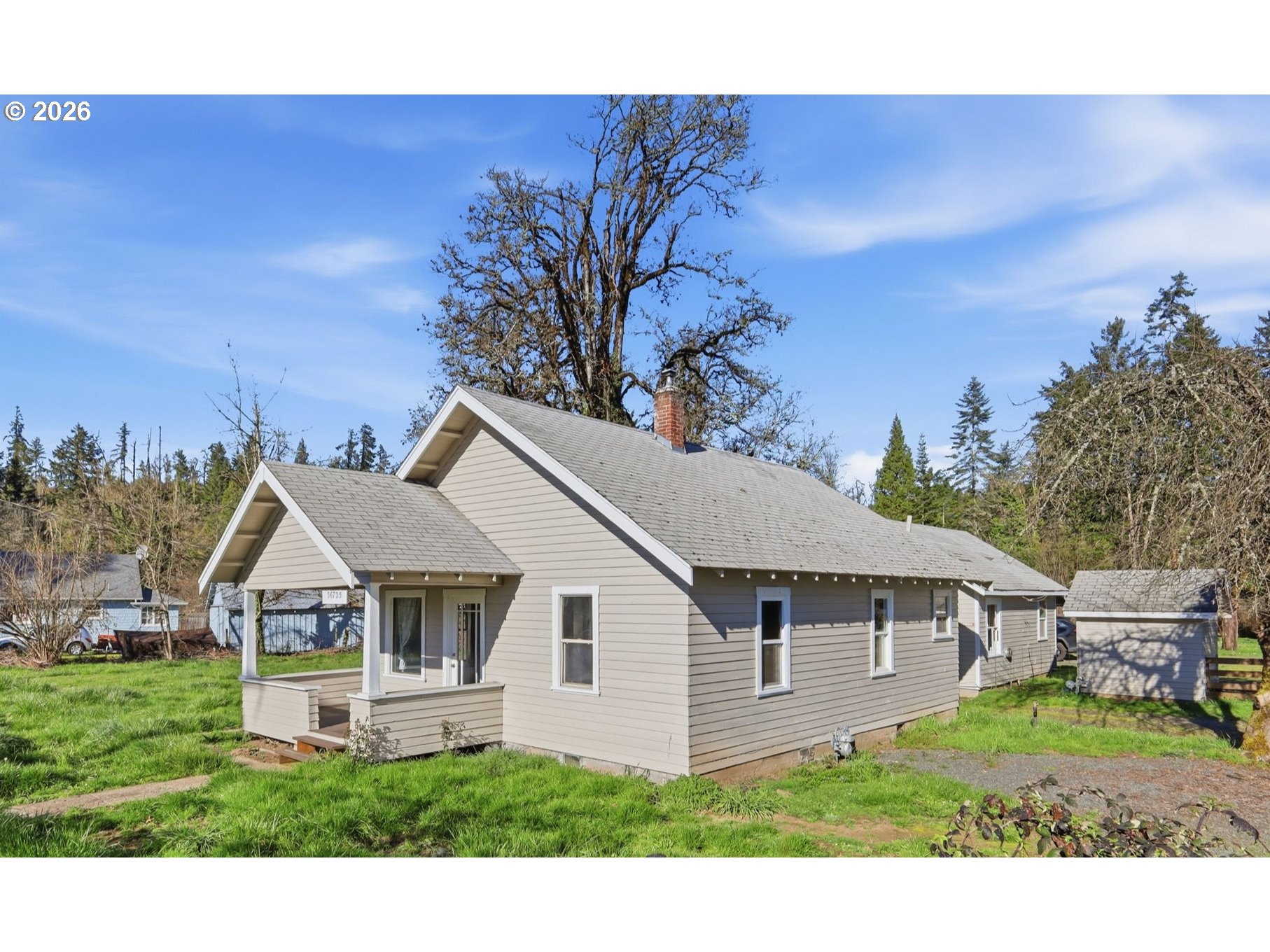 36725 Jasper Road Springfield, OR 97478 - Photo 36 of 46 a house view with a garden