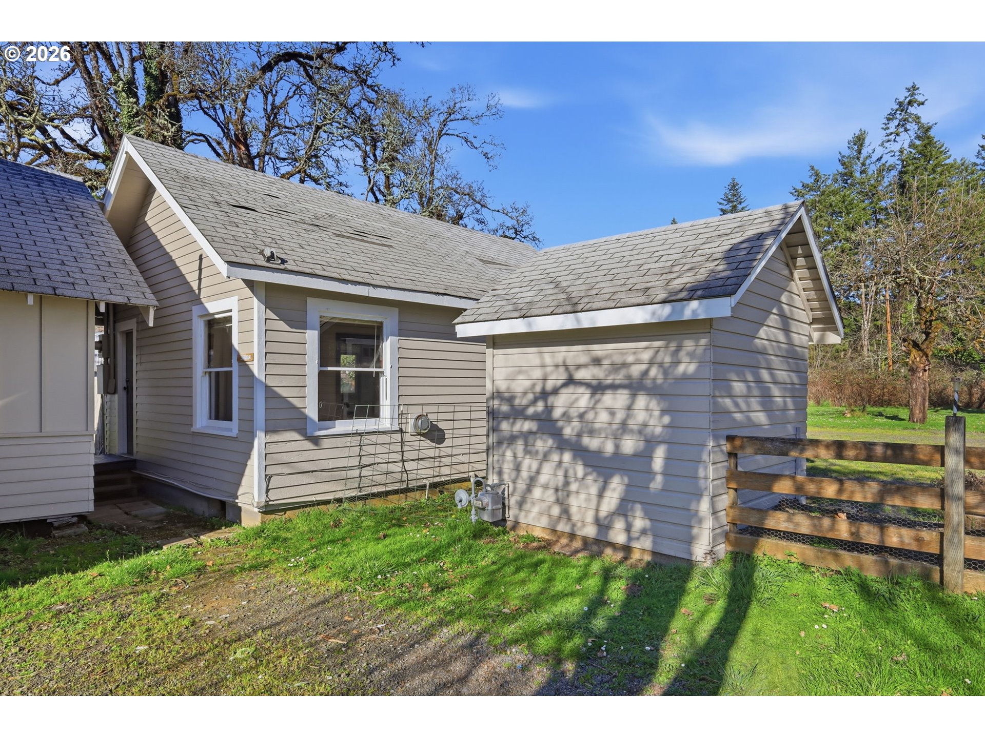 36725 Jasper Road Springfield, OR 97478 - Photo 38 of 46 a view of a house with a backyard