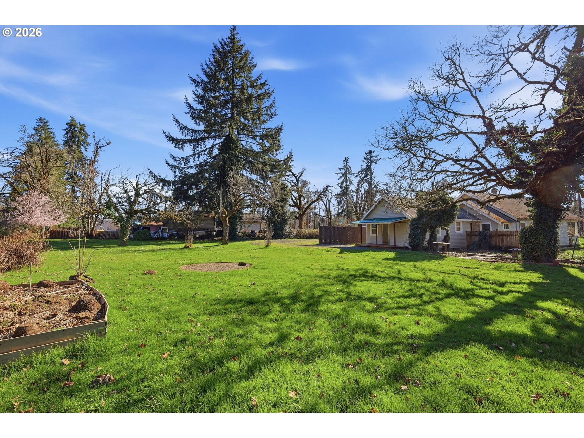 36725 Jasper Road Springfield, OR 97478 - Photo 45 of 46 a view of a garden with a tree