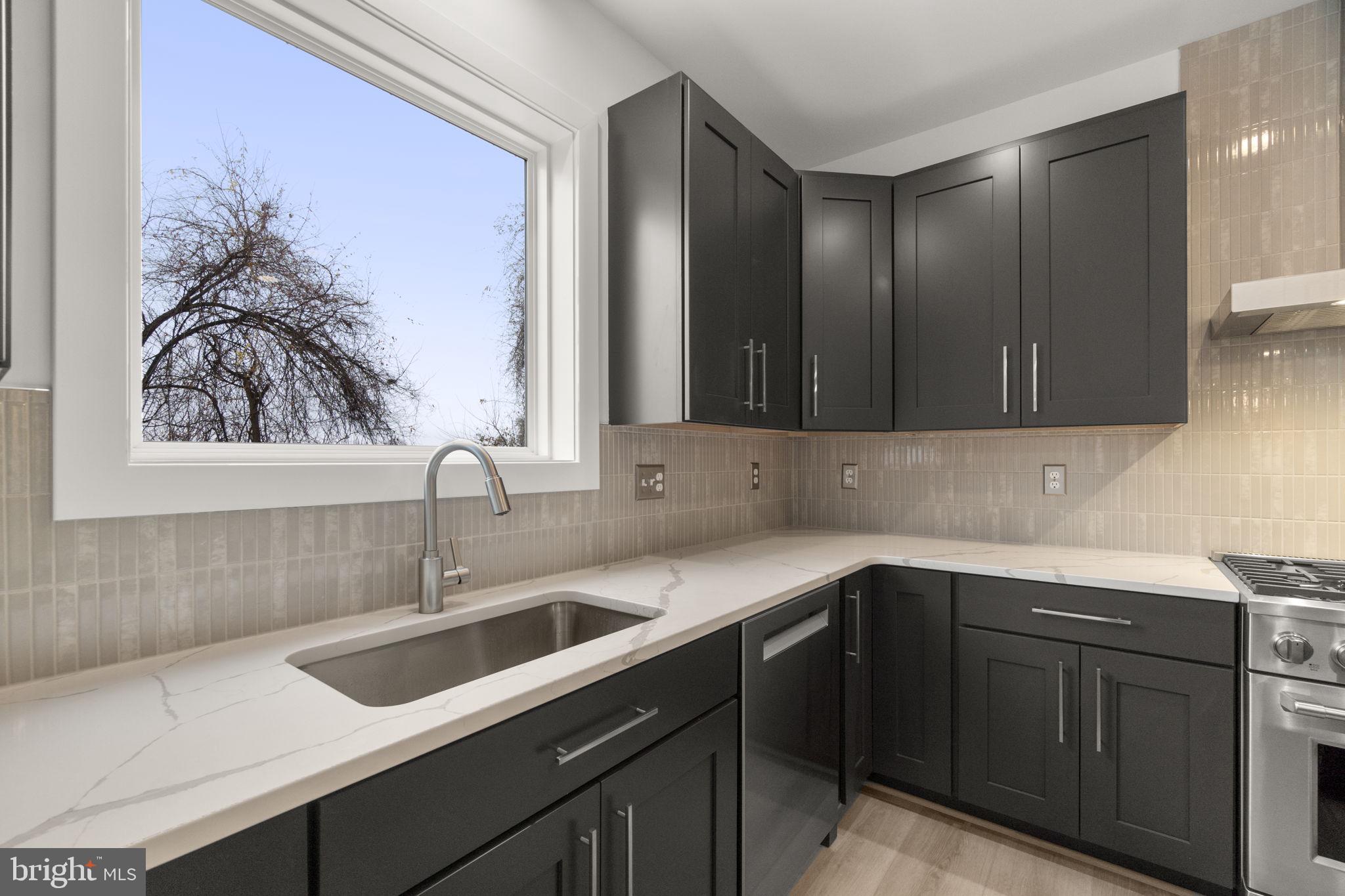 14628 Old Hanover Road, Unit BENTON Reisterstown, MD 21136 - Photo 24 of 69 a view of a kitchen with a sink and cabinets