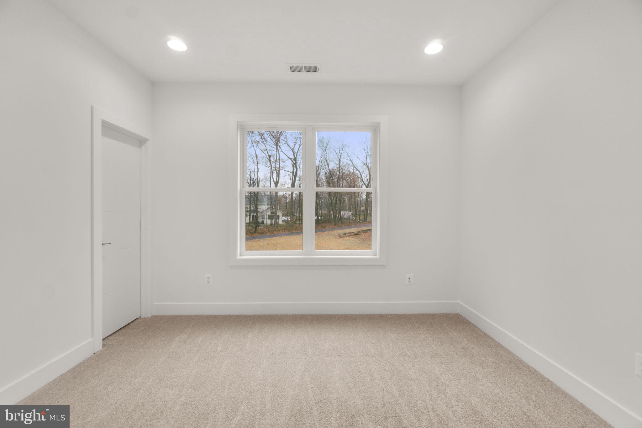 14628 Old Hanover Road, Unit BENTON Reisterstown, MD 21136 - Photo 40 of 69 an empty room with a window