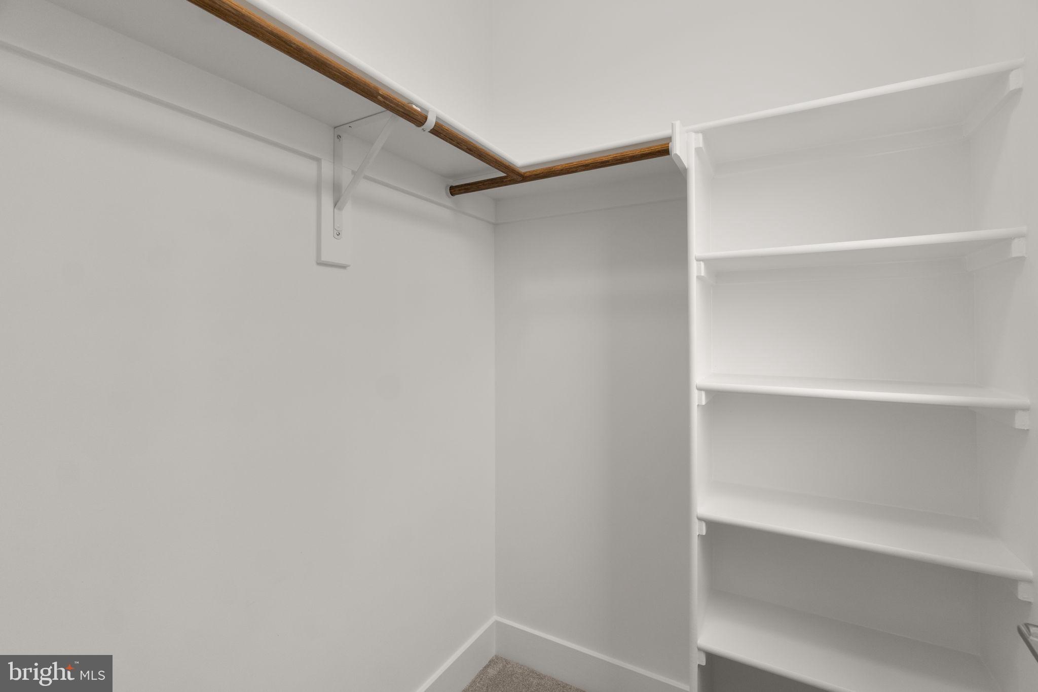 14628 Old Hanover Road, Unit BENTON Reisterstown, MD 21136 - Photo 44 of 69 a view of an empty walk in closet