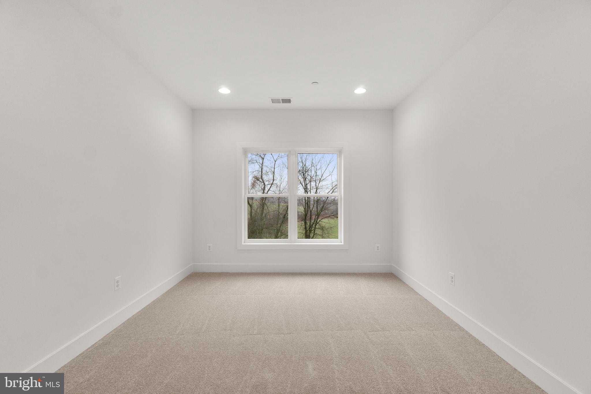 14628 Old Hanover Road, Unit BENTON Reisterstown, MD 21136 - Photo 46 of 69 a view of an empty room with a window