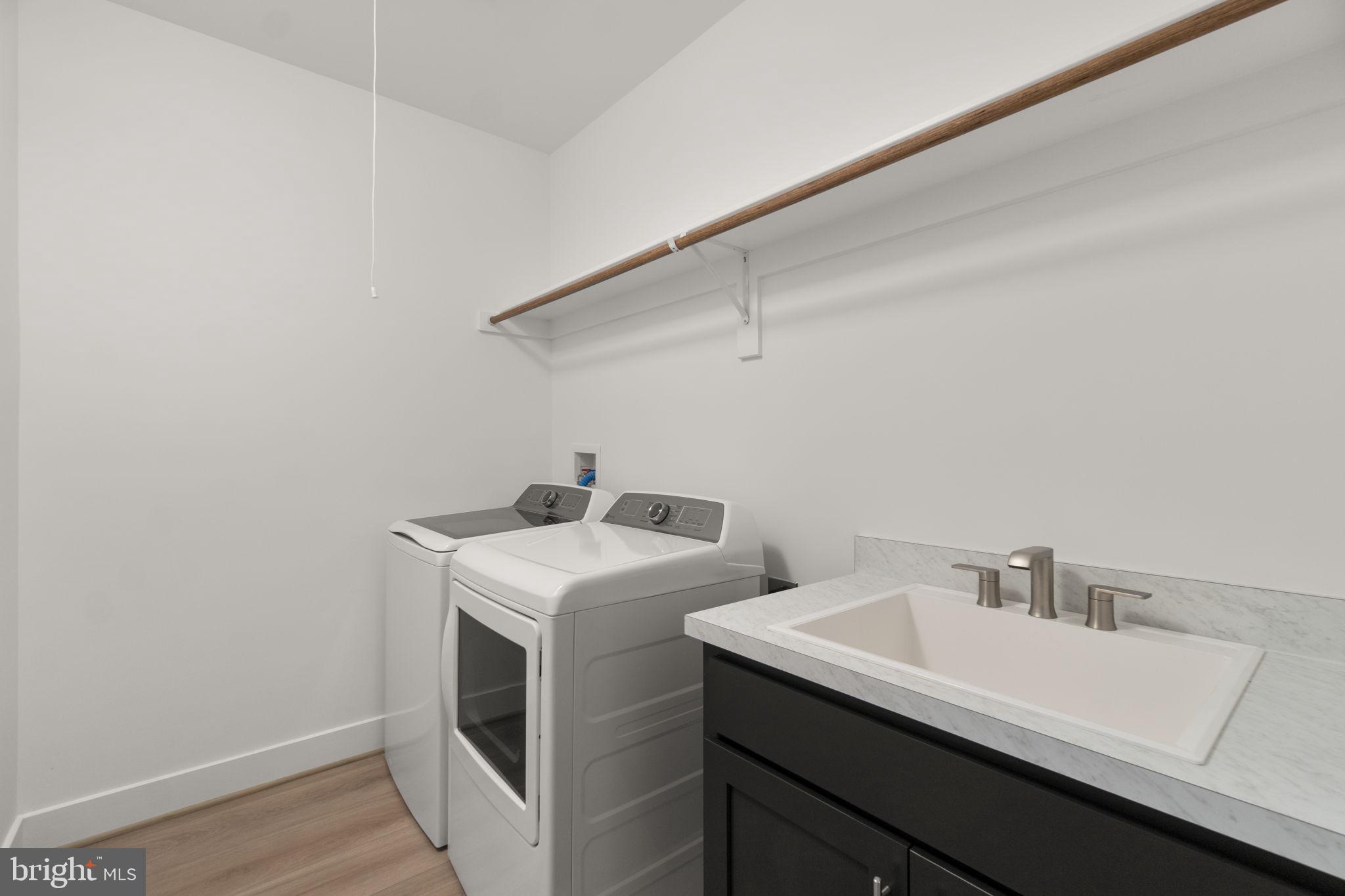 14628 Old Hanover Road, Unit BENTON Reisterstown, MD 21136 - Photo 53 of 69 a utility room with dryer and washer