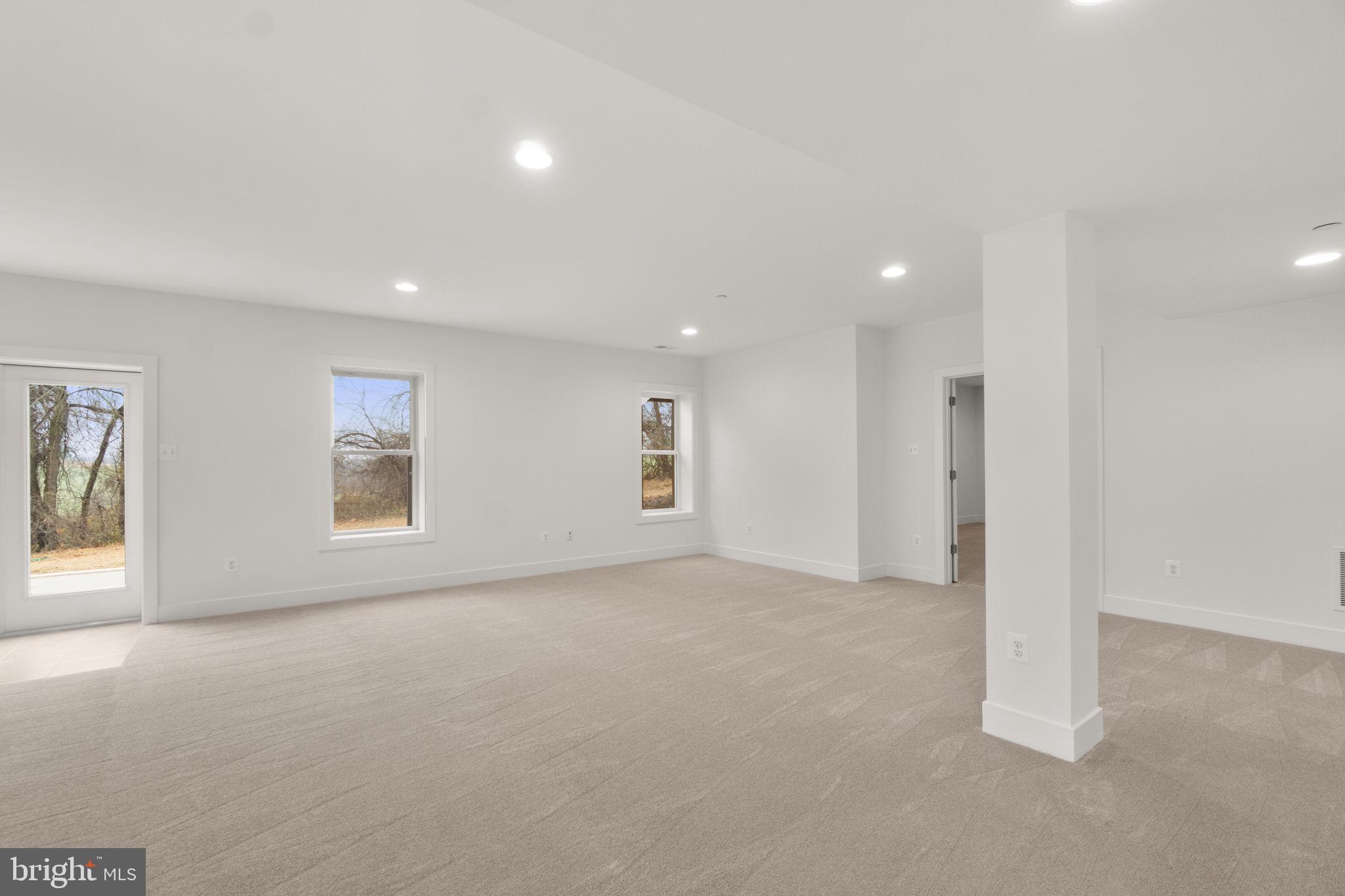 14628 Old Hanover Road, Unit BENTON Reisterstown, MD 21136 - Photo 54 of 69 an empty room with windows