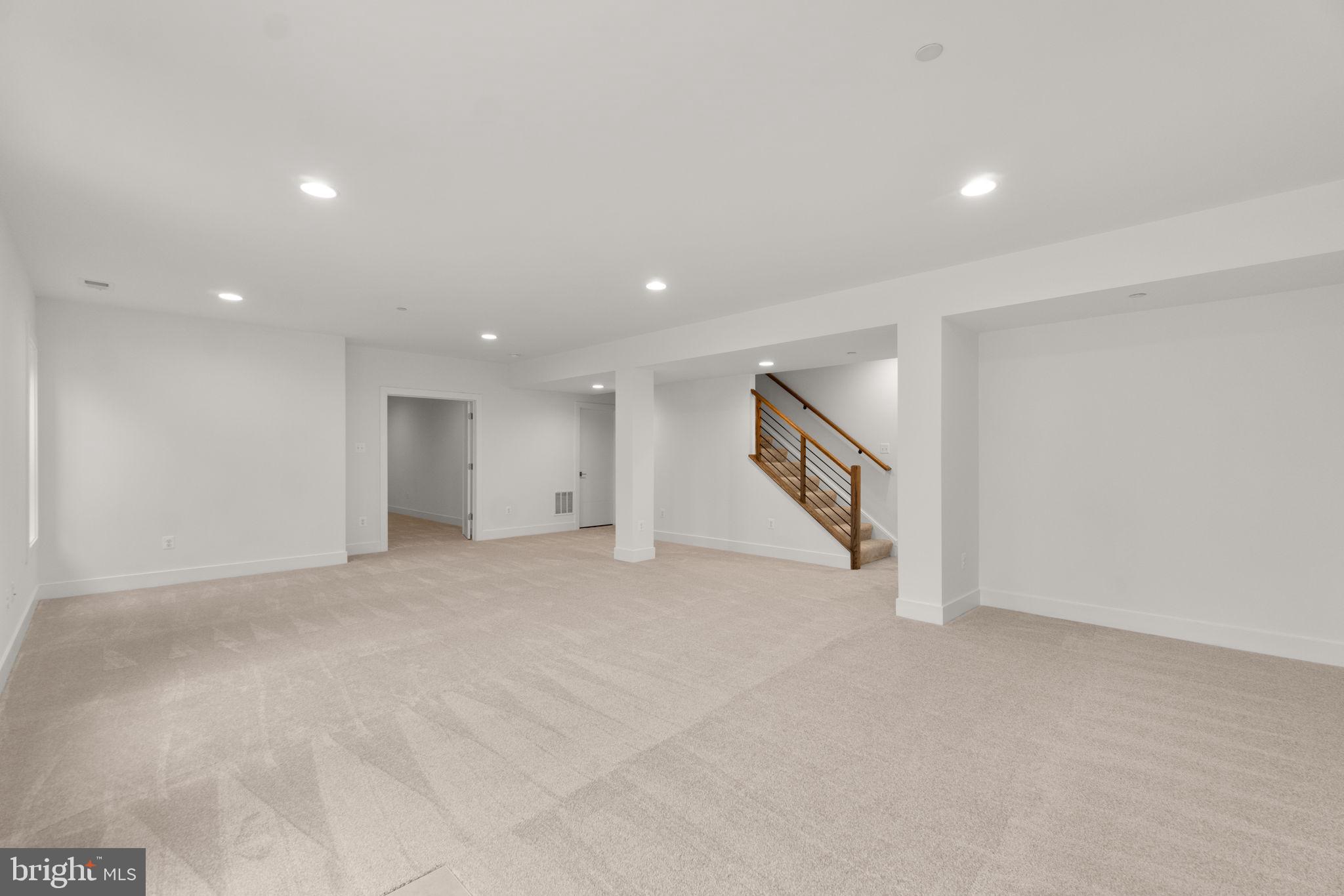 14628 Old Hanover Road, Unit BENTON Reisterstown, MD 21136 - Photo 55 of 69 a view of an empty room with stairs