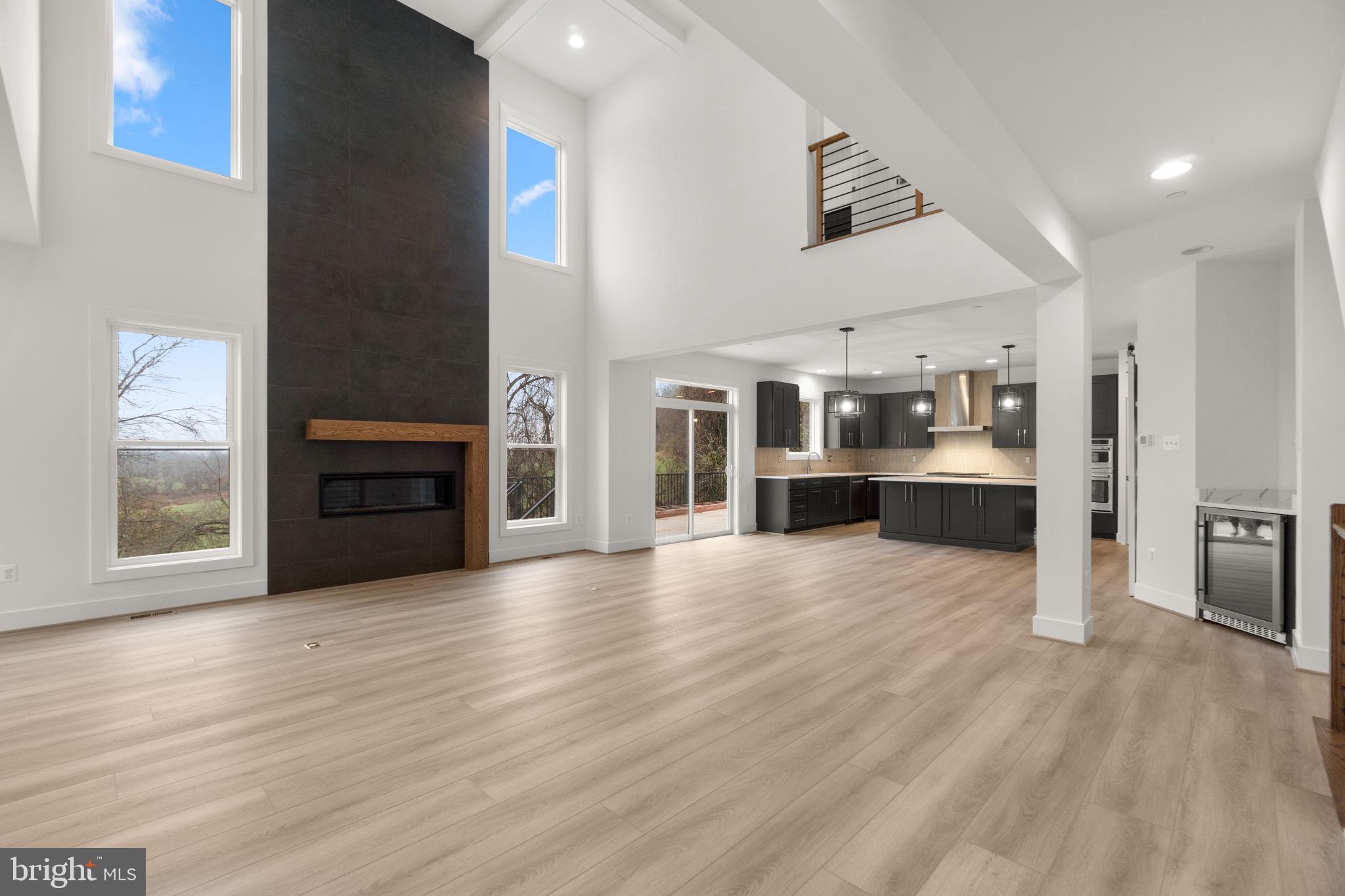 14628 Old Hanover Road, Unit BENTON Reisterstown, MD 21136 - Photo 9 of 69 a view of a kitchen with wooden floor and a kitchen