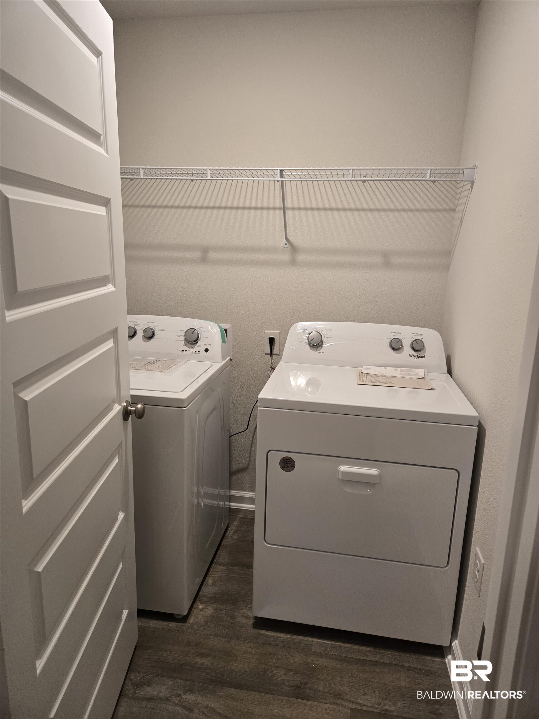 24194 Veranda Circle Elberta, AL 36530 - Photo 11 of 31 Washroom with washing machine and dryer and dark wood-type flooring