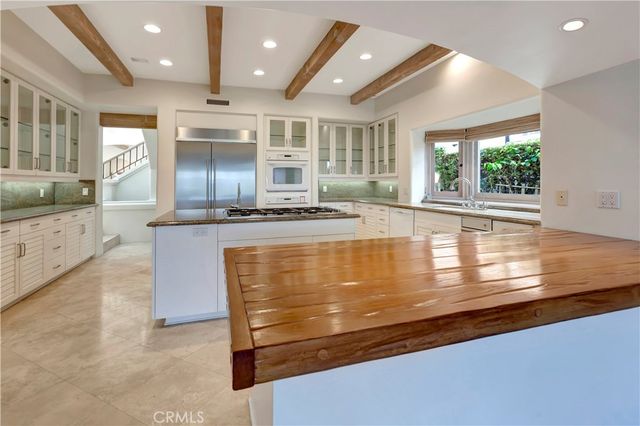 a view of staircase with lots of windows and stairs