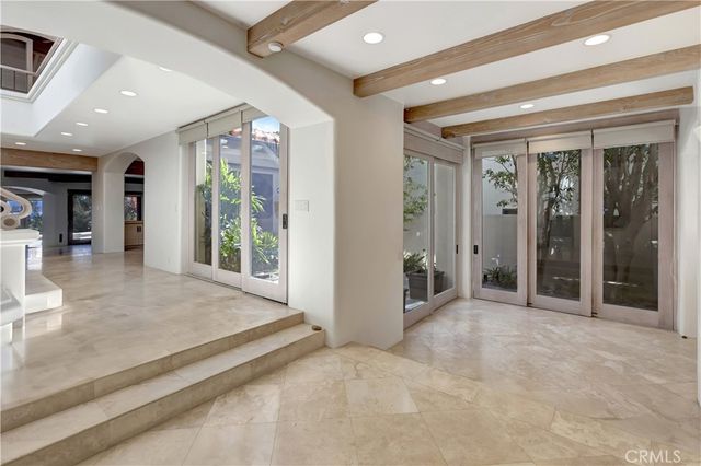 a view of a kitchen with a sink and a stove top oven