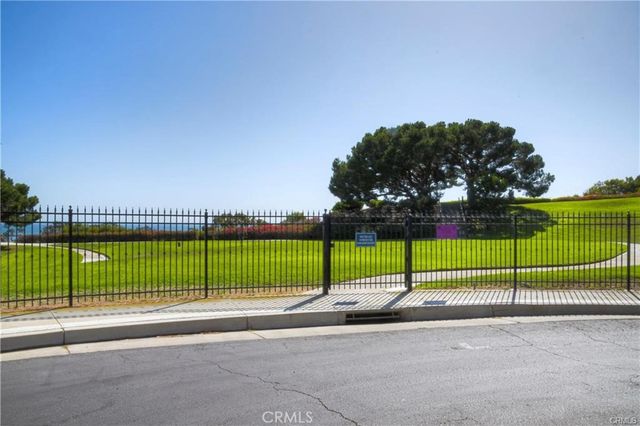 a terrace with a garden and outdoor seating