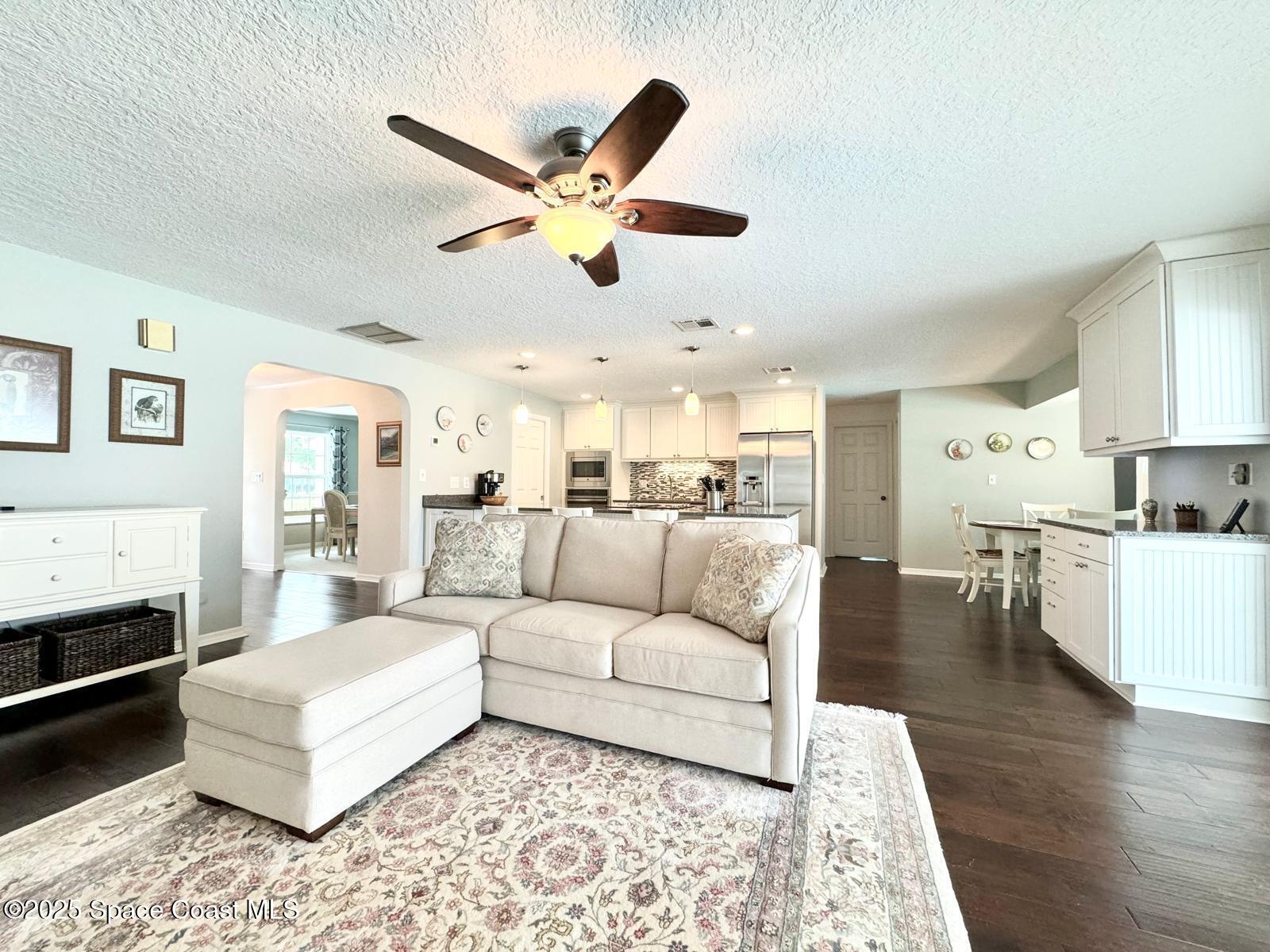420 Rio Casa Drive North Indialantic, FL 32903 - Photo 23 of 49 a living room with furniture and kitchen view