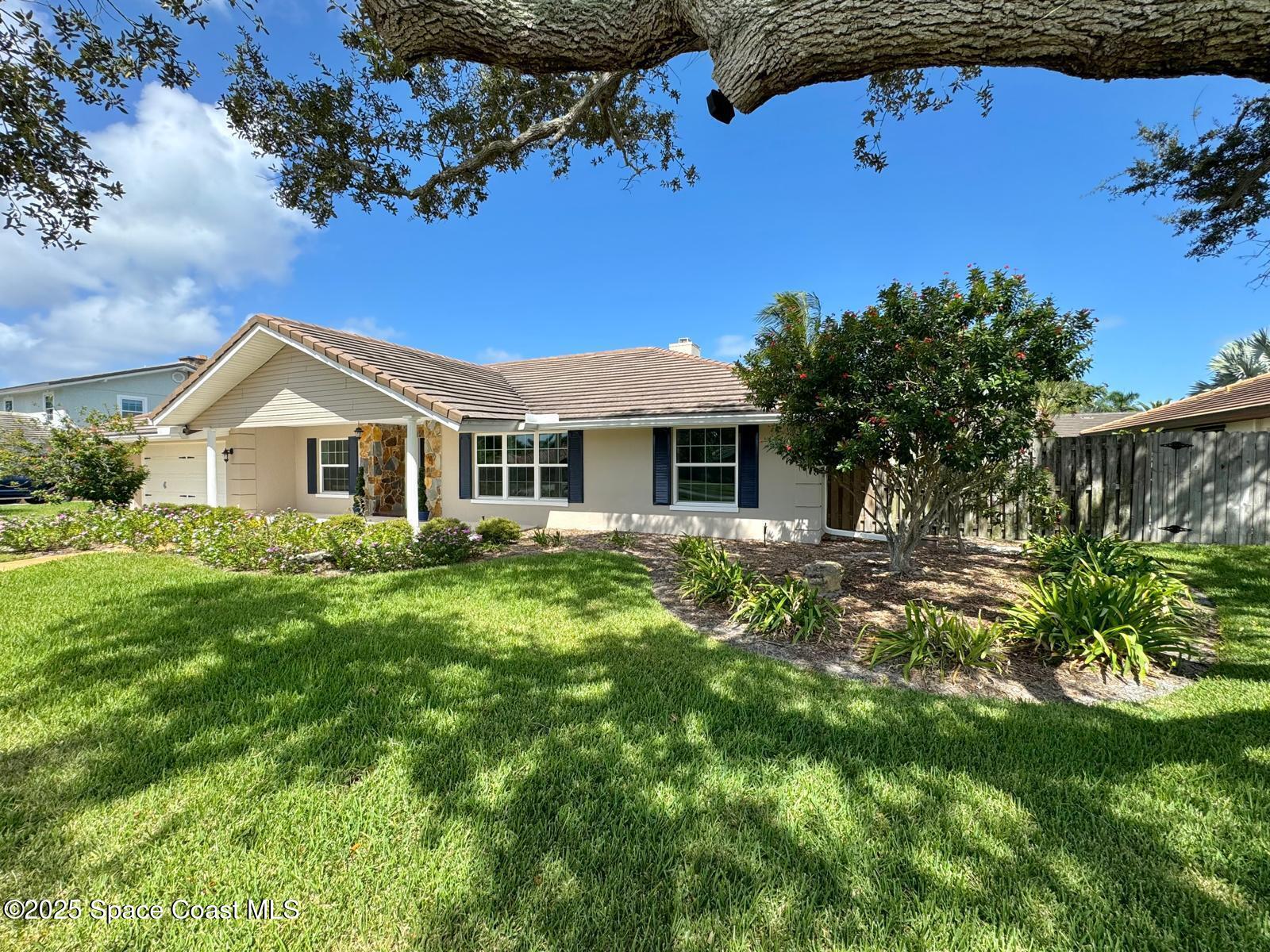 420 Rio Casa Drive North Indialantic, FL 32903 - Photo 4 of 49 a view of a house with a yard
