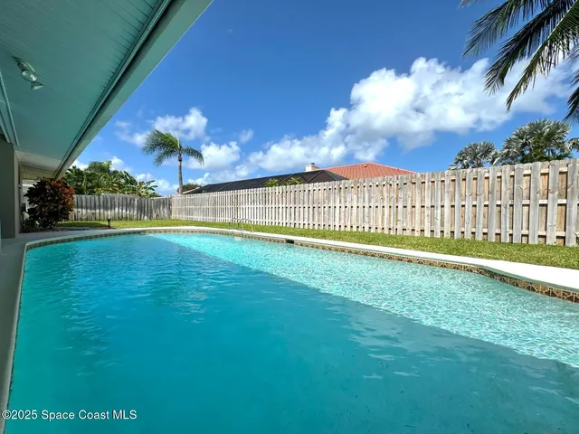 a view of a house with a big yard
