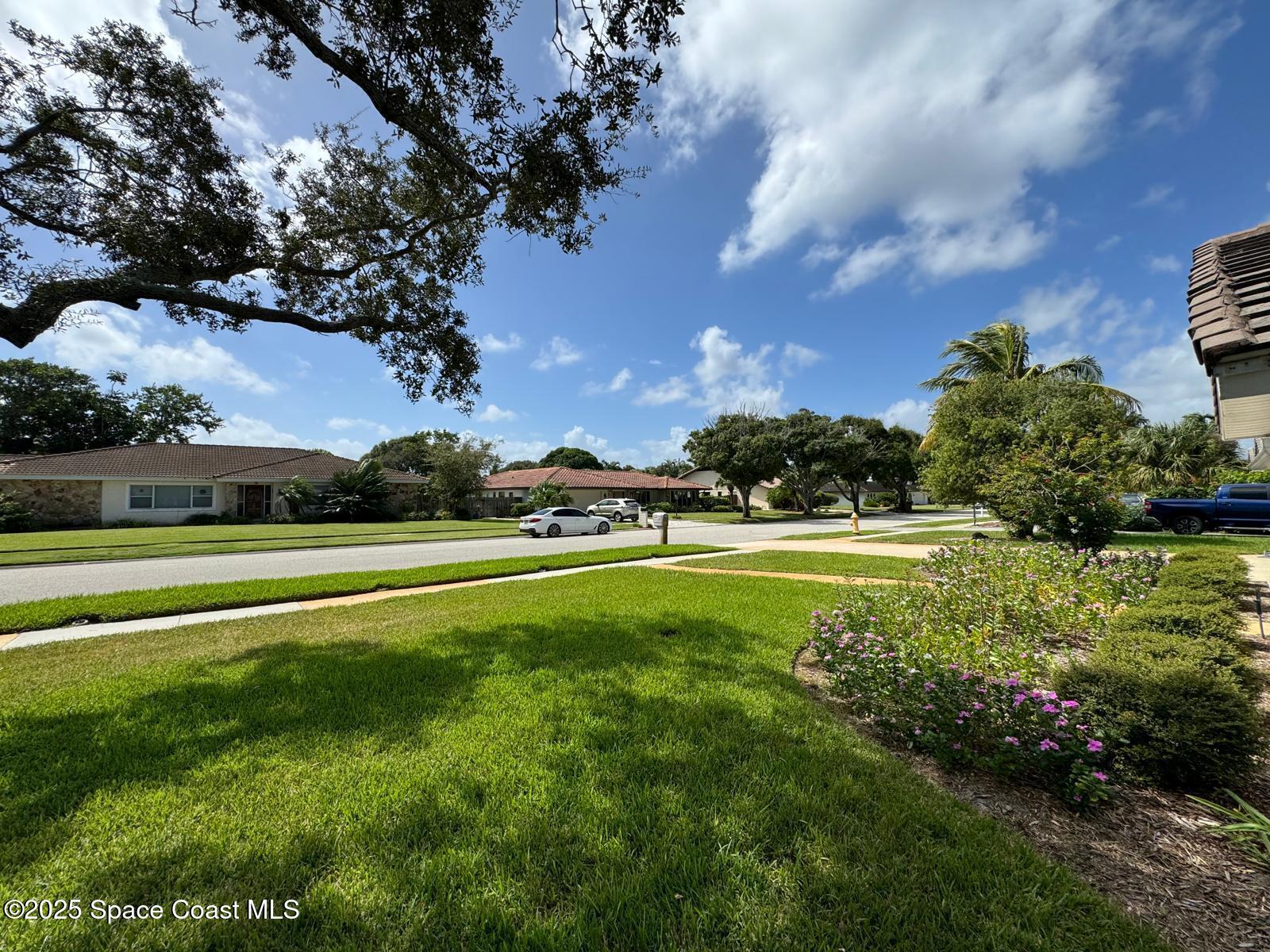 420 Rio Casa Drive North Indialantic, FL 32903 - Photo 48 of 49 a view of a house with a yard