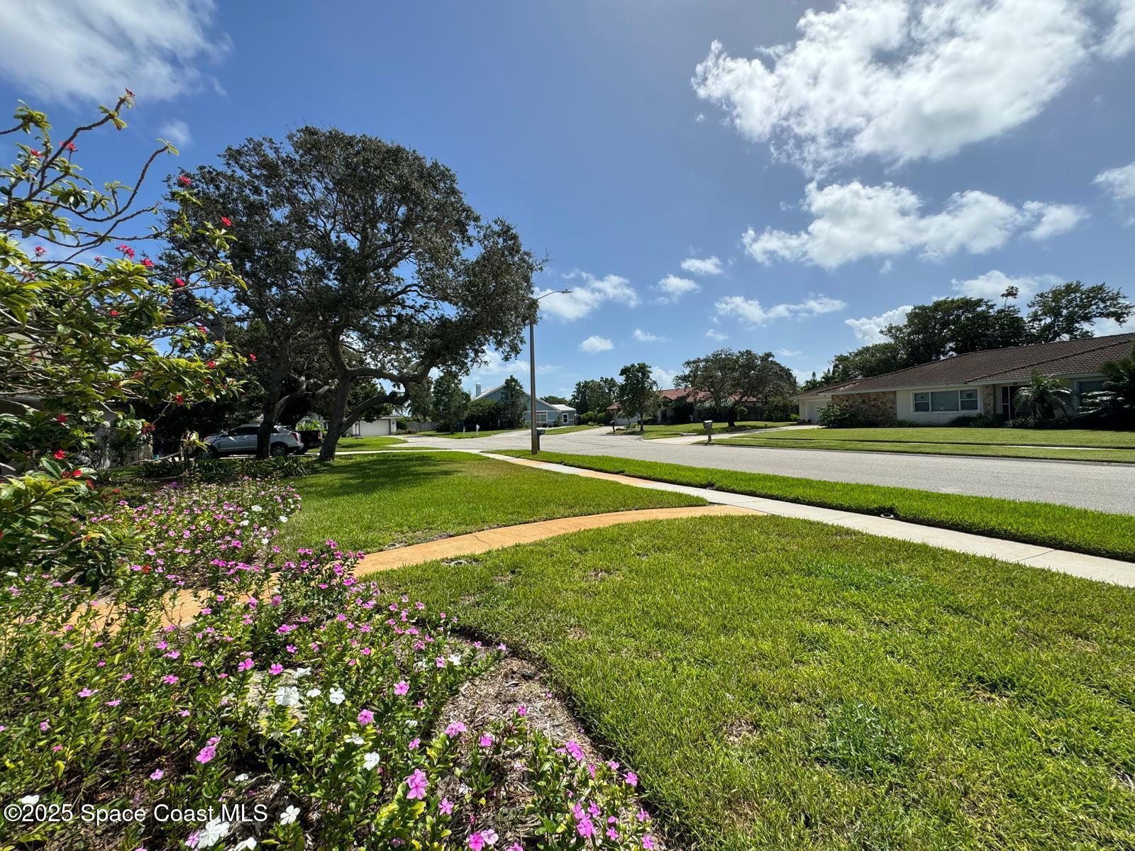 420 Rio Casa Drive North Indialantic, FL 32903 - Photo 49 of 49 a view of a golf course with a lake