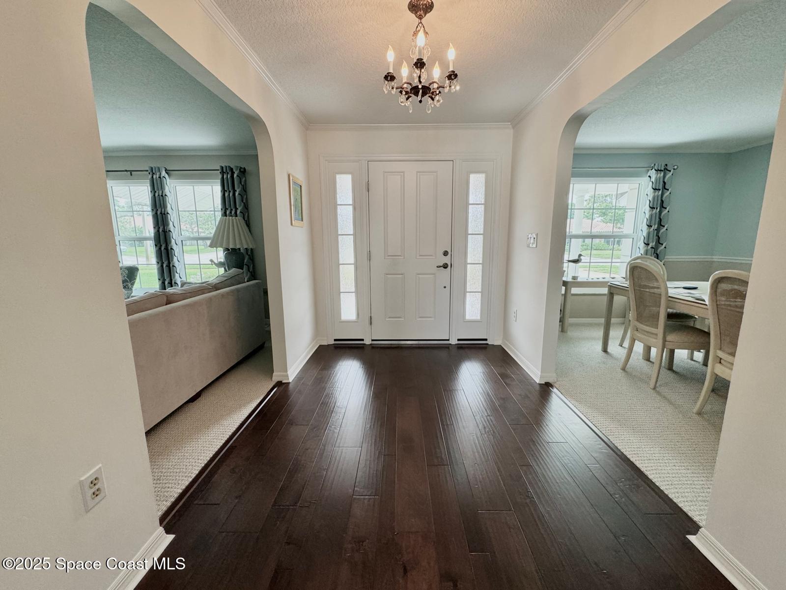 420 Rio Casa Drive North Indialantic, FL 32903 - Photo 6 of 49 wooden floor in an empty room with a window