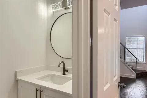 a kitchen with cabinets and sink