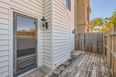 a view of a door and a window