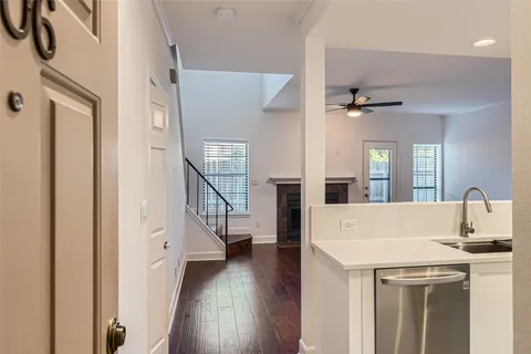 a view of a hallway with a white walls