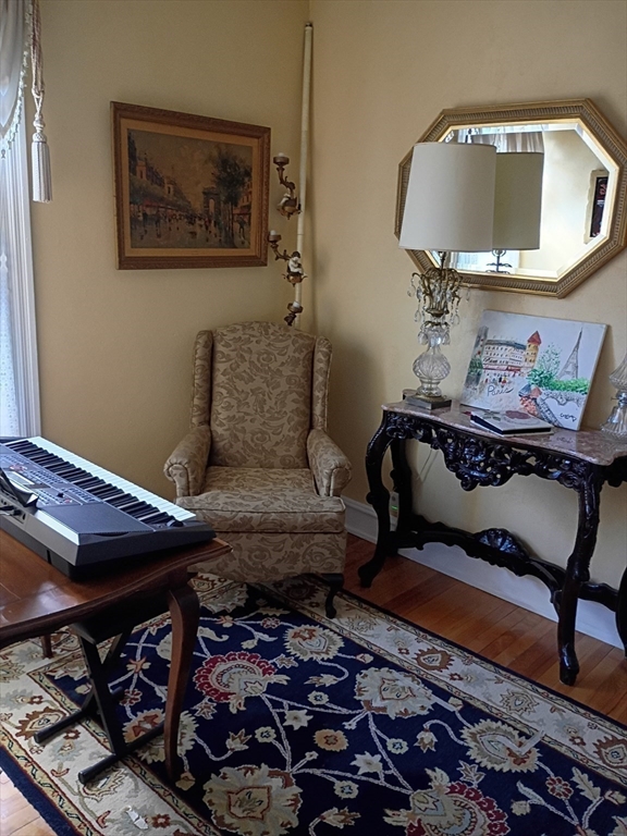 333 Langley Street Fall River, MA 02720 - Photo 28 of 42 a living room with furniture and wooden floor
