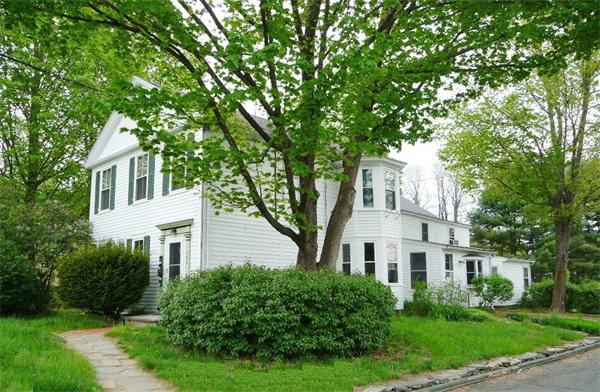 340 Bridge Road Northampton, MA 01062 - Photo 1 of 22 a view of white house with a yard and large trees