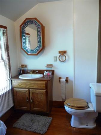 340 Bridge Road Northampton, MA 01062 - Photo 14 of 22 a bathroom with a toilet a sink and a mirror