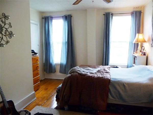 340 Bridge Road Northampton, MA 01062 - Photo 19 of 22 a bedroom with a bed and wooden floor