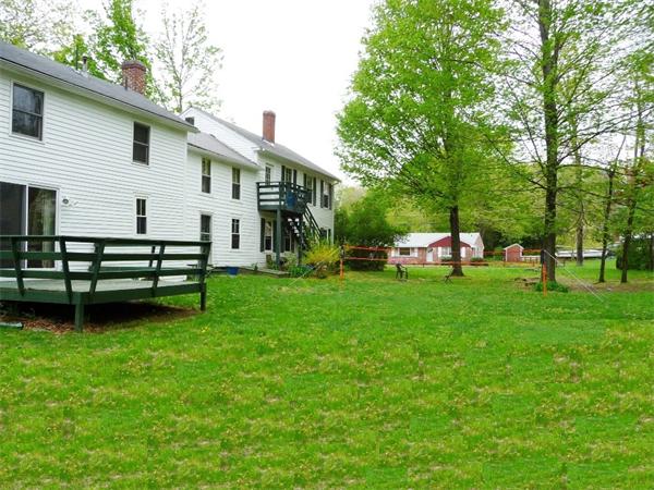 340 Bridge Road Northampton, MA 01062 - Photo 22 of 22 a view of a house with a backyard