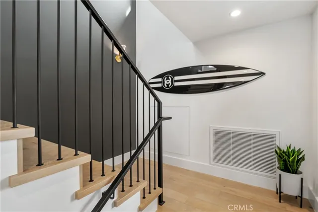 a view of entryway with wooden floor