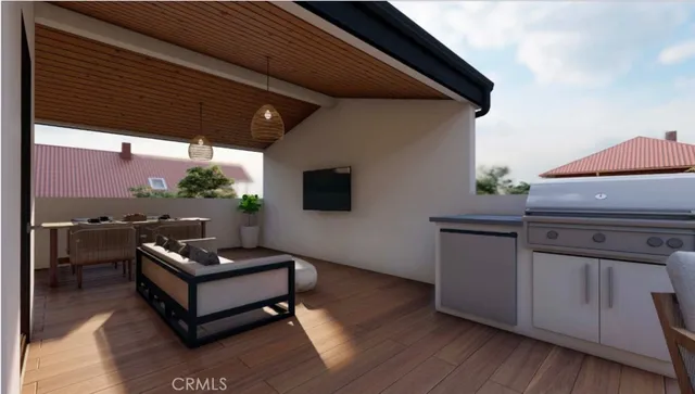 a reading room with wooden floor and furniture