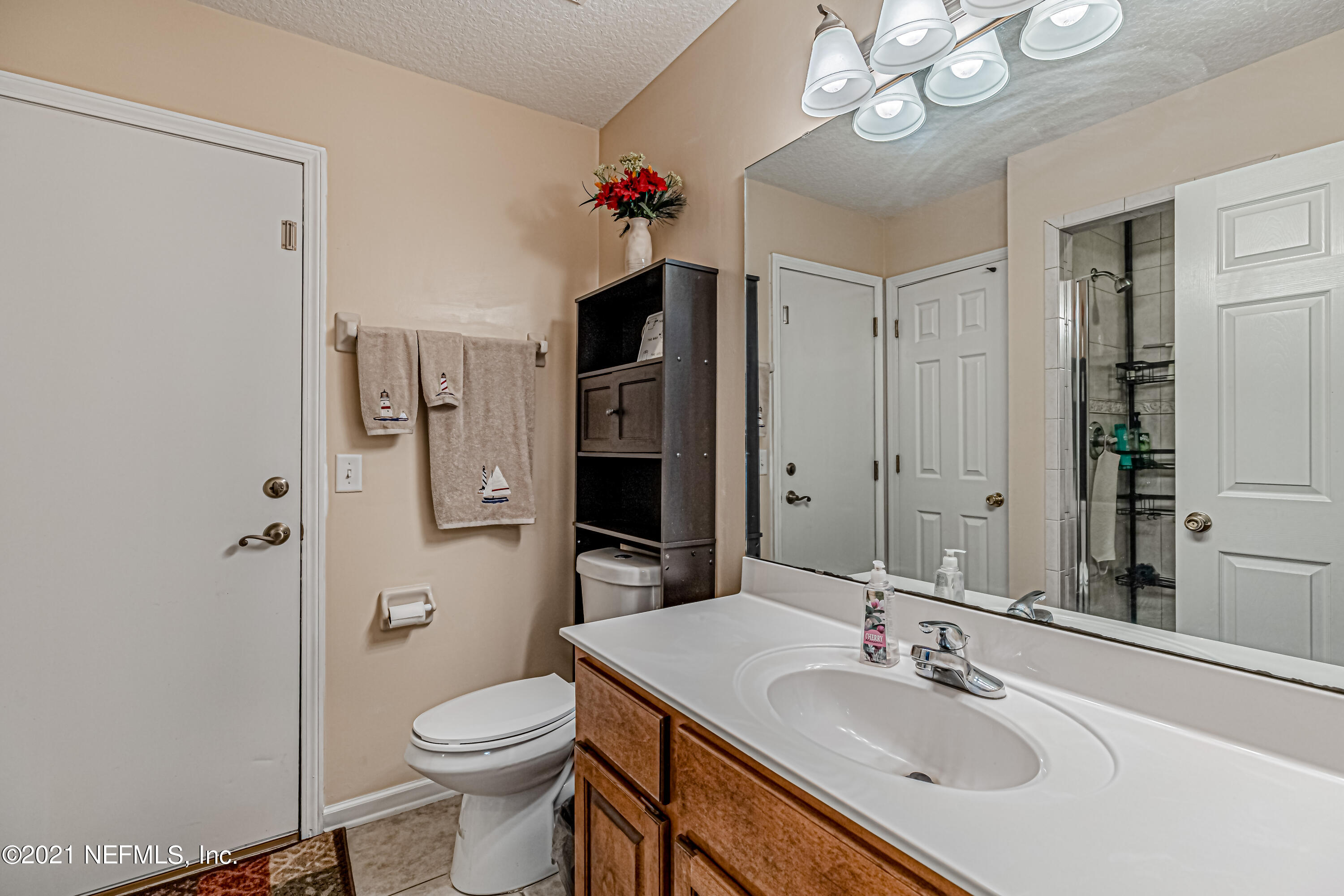 3108 Longleaf Ranch Circle Middleburg, FL 32068 - Photo 18 of 37 18-First Bathroom