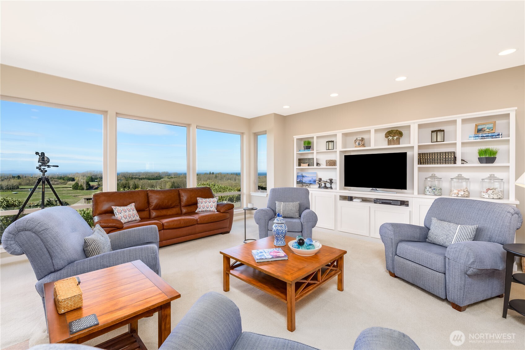 771 Brigadoon Boulevard Sequim, WA 98382 - Photo 12 of 40 a living room with furniture and a flat screen tv