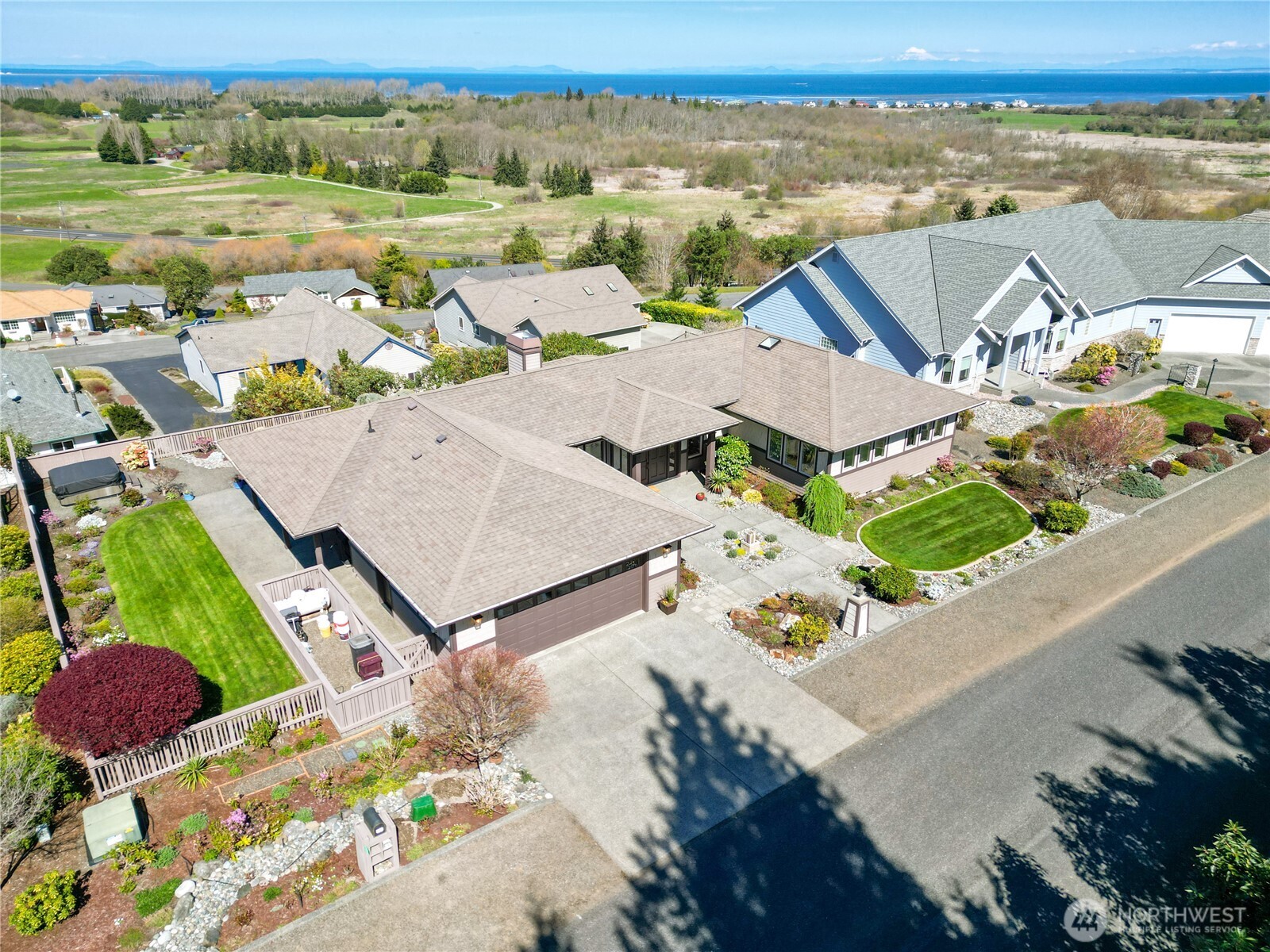 771 Brigadoon Boulevard Sequim, WA 98382 - Photo 3 of 40 an aerial view of a house with a ocean view
