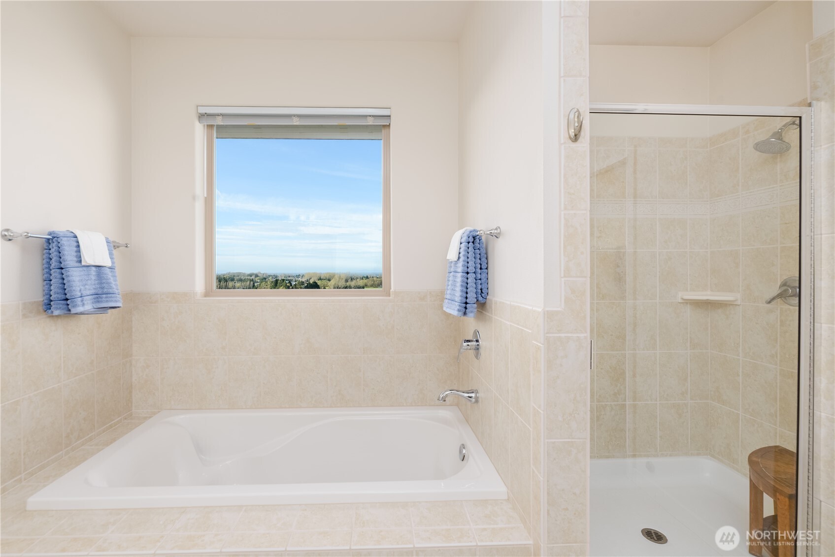 771 Brigadoon Boulevard Sequim, WA 98382 - Photo 31 of 40 a white bath tub sitting next to a shower