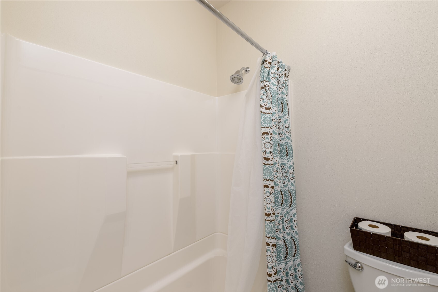 771 Brigadoon Boulevard Sequim, WA 98382 - Photo 40 of 40 a bathroom with a shower curtain and a sink