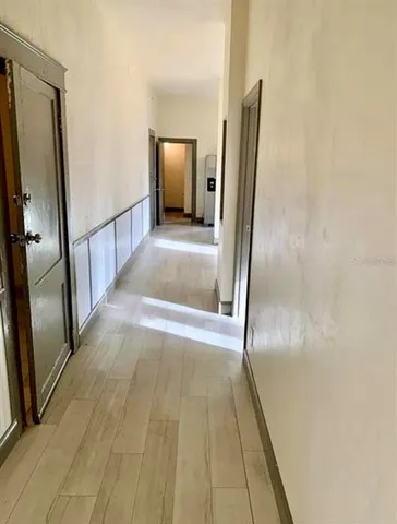 a view of an empty room and window