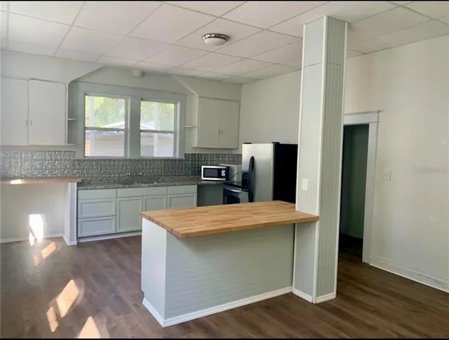 an empty room that has a window