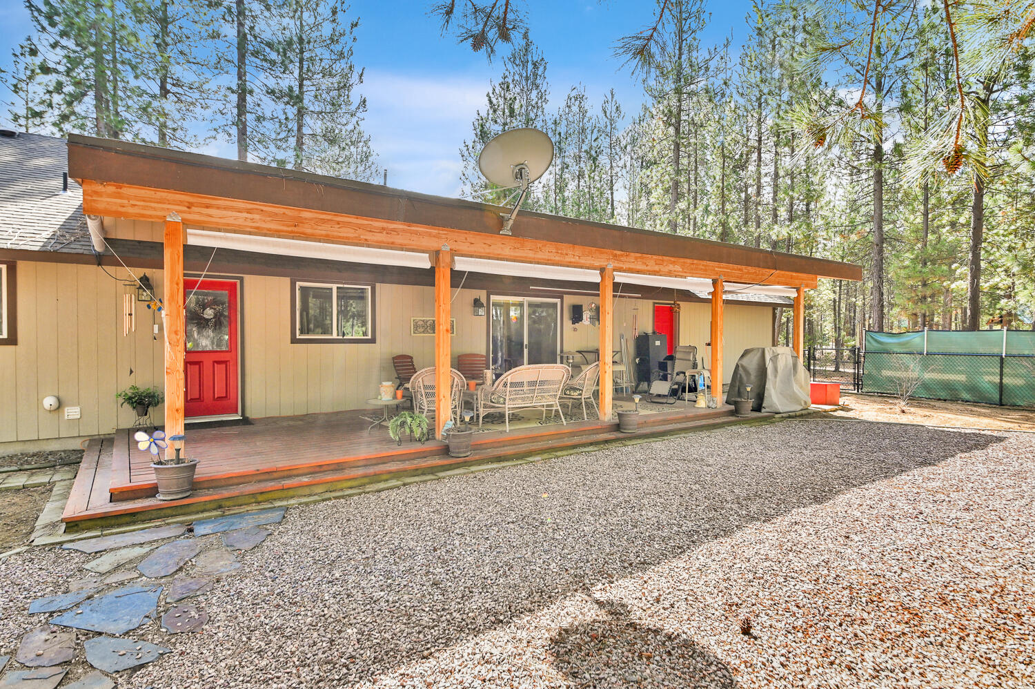 14840 Laurel Road La Pine, OR 97739 - Photo 25 of 32 a view of a house with backyard and sitting area