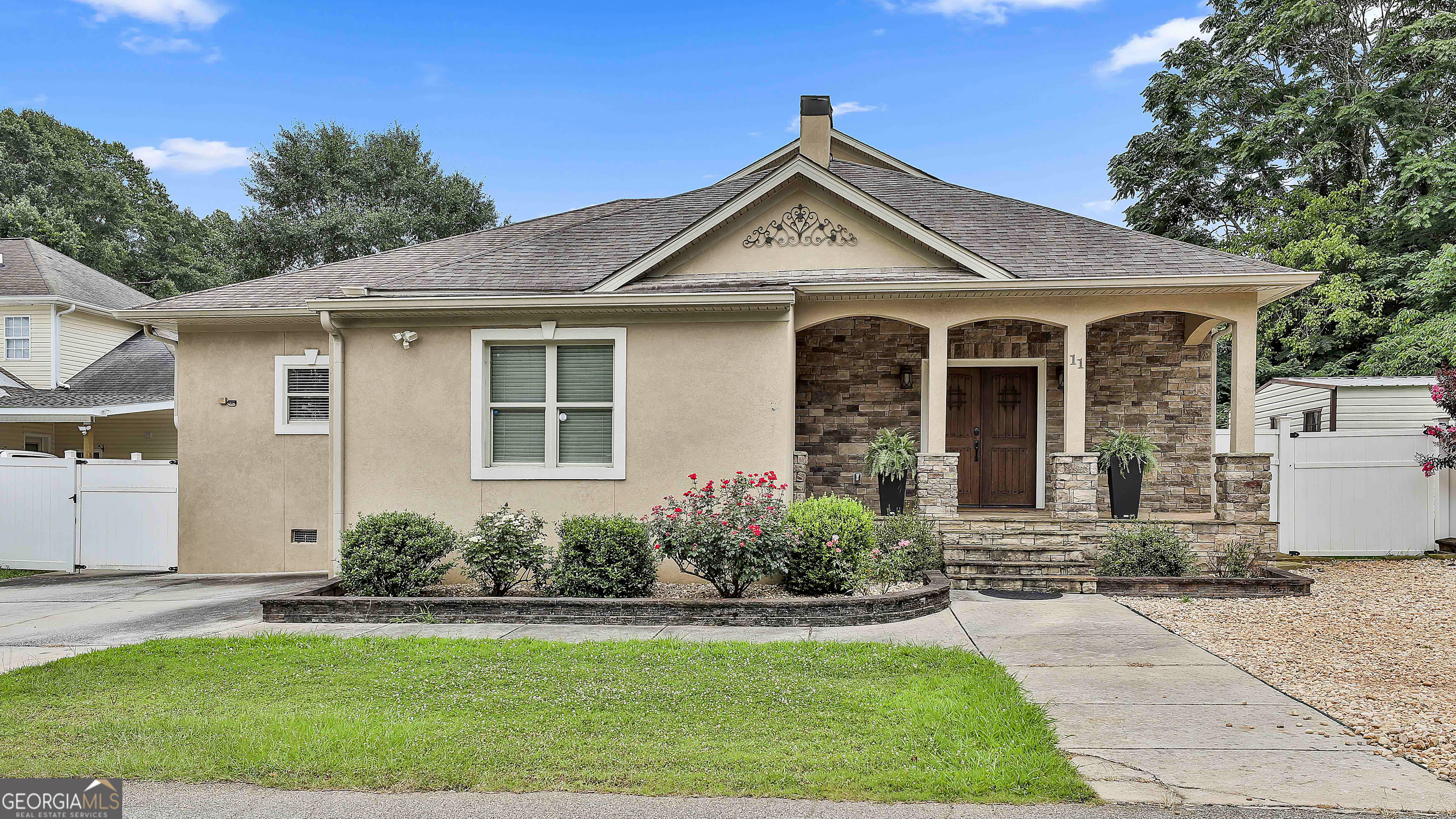 a front view of a house with a yard