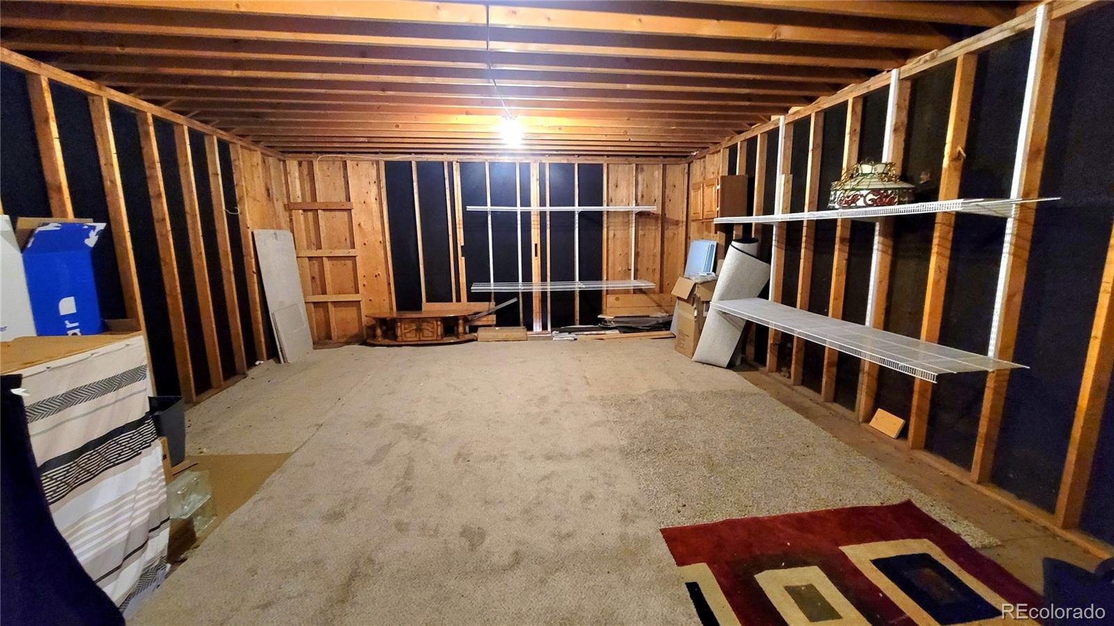 10807 Timothys Drive Conifer, CO 80433 - Photo 39 of 39 a view of furniture and staircase