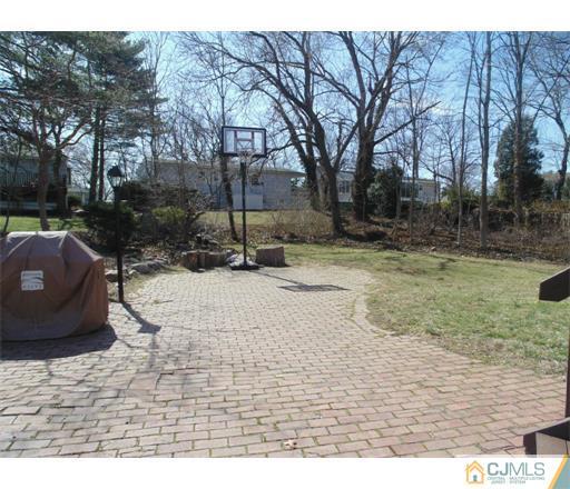 28 Bodnarik Road Edison, NJ 08837 - Photo 2 of 7 a view of outdoor space with garden